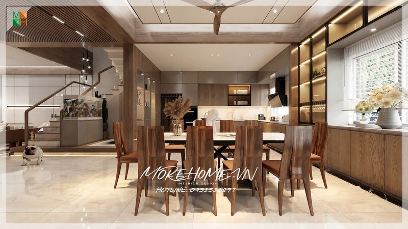 Kệ tủ được chia làm 2 phần. Phần trên là những ngăn tủ kính nhỏ được tận dụng làm nơi trưng bày những món đồ trang trí bắt mắt. Phần dưới là những ngăn tủ cánh kính được sử dụng để bảo quản những đồ dùng, vật dụng của nhà bếp.